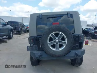 2008 Jeep Wrangler Unlimited Sahara with VIN 1J4GB59198L619802, listed as a IAAI auction lot 42361793 with 272,295 mi miles and . Bid and sale history available at DreamBid. Image 17.