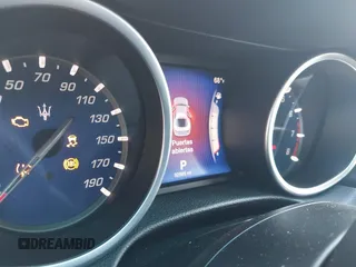 2014 Maserati Ghibli S Q4 z VIN ZAM57RTA9E1106695, wystawiony jako IAAI lot #40783416 z przebiegiem 92 885 mil mil oraz . Historia ofert i sprzedaży dostępna na DreamBid. Obrazek 7.