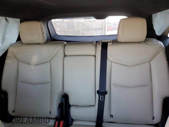 2019 Cadillac XT5 Luxury FWD z VIN 1GYKNCRS4KZ221304, wystawiony jako Copart lot #54995415 z przebiegiem 128 940 mil mil oraz Szkoda całkowita • Salvage title. Historia ofert i sprzedaży dostępna na DreamBid. Obrazek 10.