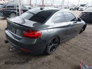 2014 BMW 2 Series 228i with VIN WBA1F5C5XEV255284, listed as a IAAI auction lot 41895642 with 62,079 mi miles and . Bid and sale history available at carsss.com. Image 4.