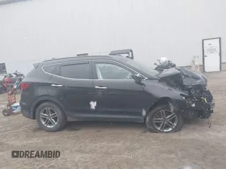 2018 Hyundai Santa Fe 2.4L z VIN 5NMZUDLB7JH098638, wystawiony jako IAAI lot #42055793 z przebiegiem 63 516 mil mil oraz . Historia ofert i sprzedaży dostępna na DreamBid. Obrazek 13.
