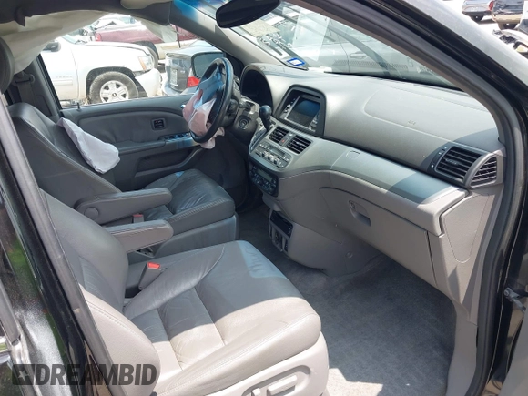 2010 Honda Odyssey Touring с VIN 5FNRL3H90AB070720, выставлен на аукционе IAAI как лот 42335181 с пробегом 145 205 миль миль и . История ставок и продаж доступна на DreamBid. Изображение 5.