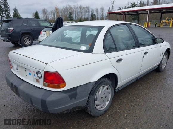 1997 Saturn SL with VIN 1G8ZF5283VZ400170, listed as a IAAI auction lot 41884490 with 171,635 mi miles. Bid and sale history available at carsss.com. Image 4.