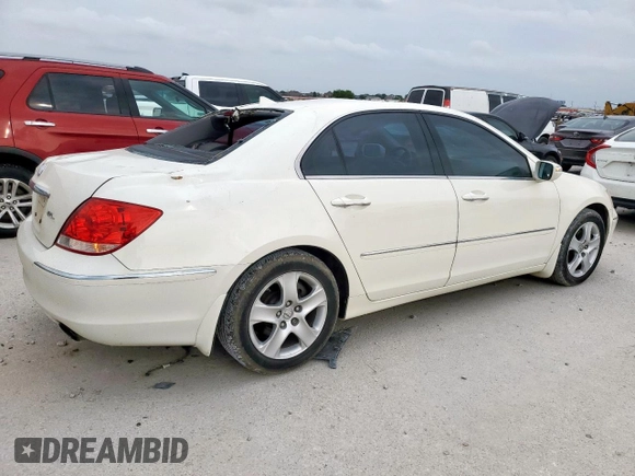 2006 Acura RL with VIN JH4KB16596C010835, listed as a Copart auction lot 54593615 with 253,575 mi miles and Salvage Title. Bid and sale history available at DreamBid. Image 3.