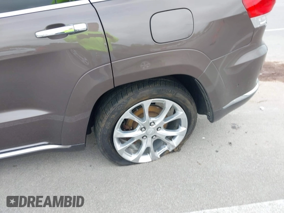 2020 Jeep Grand Cherokee Summit with VIN 1C4RJFJG1LC170714, listed as a IAAI auction lot 42247702 with 78,614 mi miles and . Bid and sale history available at DreamBid. Image 19.