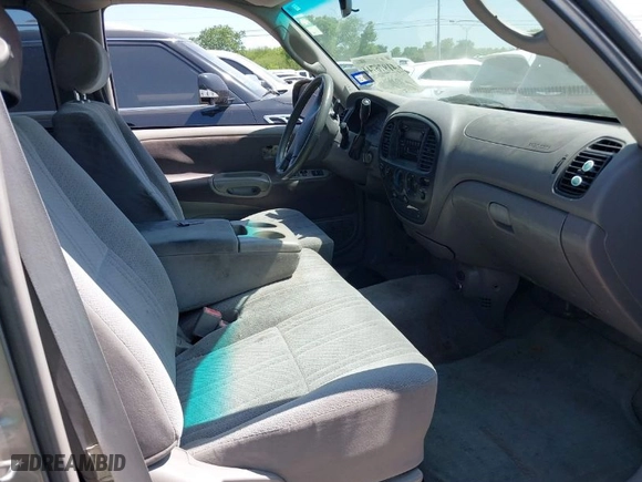 2002 Toyota Tundra SR5 with VIN 5TBRN34152S283145, listed as a IAAI auction lot 41976744 with 198,574 mi miles. Bid and sale history available at carsss.com. Image 5.
