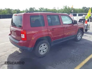 2014 Jeep Patriot Sport with VIN 1C4NJRBB7ED809503, listed as a IAAI auction lot 42224798 with 167,086 mi miles and . Bid and sale history available at DreamBid. Image 4.