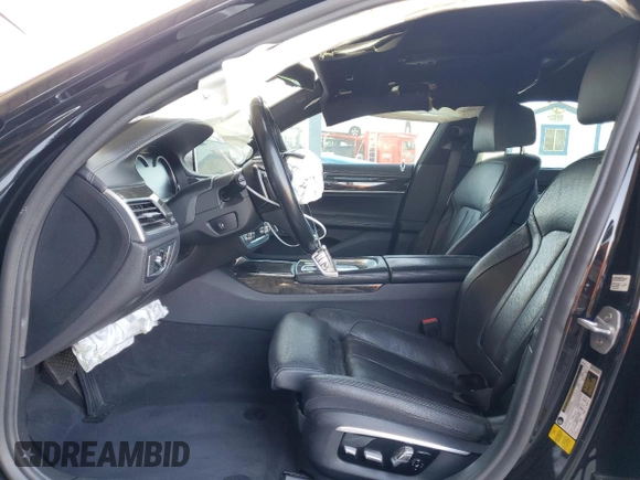 2016 BMW 7 Series 740i with VIN WBA7E2C55GG547282, listed as a Copart auction lot 57740095 with Not provided miles and Salvage title. Bid and sale history available at DreamBid. Image 7.