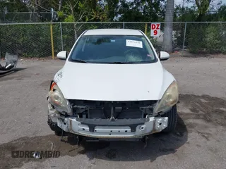 2013 Mazda 3 i SV with VIN JM1BL1TF3D1795969, listed as a IAAI auction lot 42075242 with 169,331 mi miles. Bid and sale history available at carsss.com. Image 12.