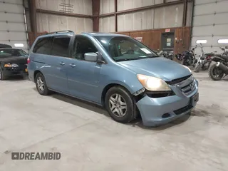 2006 Honda Odyssey EX-L with VIN 5FNRL38726B078467, listed as a IAAI auction lot 41874268 with 178,580 mi miles and . Bid and sale history available at DreamBid. Image 1.