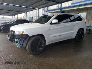 2015 Jeep Grand Cherokee Summit with VIN 1C4RJFJT1FC844975, listed as a Copart auction lot 45424455 with 75,471 mi miles and Salvage Title. Bid and sale history available at carsss.com. Image 1.