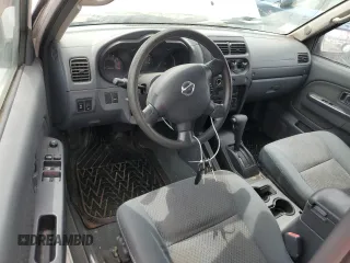 2003 Nissan Xterra XE with VIN 5N1ED28TX3C701843, listed as a Copart auction lot 58618925 with 137,310 mi miles and Clean title. Bid and sale history available at DreamBid. Image 8.