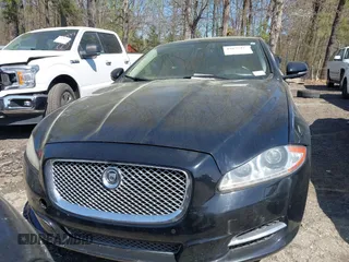 2013 Jaguar XJ Portfolio z VIN SAJWJ2GD0D8V49329, wystawiony jako IAAI lot #41829426 z przebiegiem 125 584 mil mil oraz . Historia ofert i sprzedaży dostępna na DreamBid. Obrazek 6.