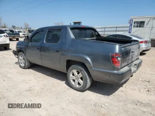 2013 Honda Ridgeline RTL with VIN 5FPYK1F51DB012680, listed as a Copart auction lot 50987085 with 63,372 mi miles and Salvage Title. Bid and sale history available at carsss.com. Image 2.