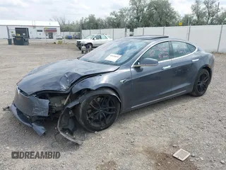 2019 Tesla Model S 75D with VIN 5YJSA1E22KF300407, listed as a IAAI auction lot 40034839 with 59,178 mi miles and . Bid and sale history available at DreamBid. Image 16.