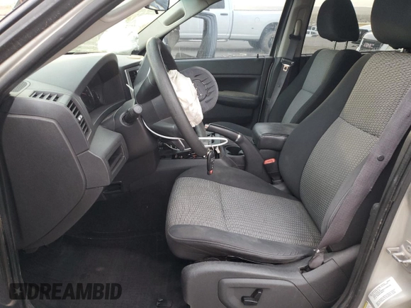 2010 Jeep Grand Cherokee Laredo with VIN 1J4PR4GK8AC111117, listed as a Copart auction lot 48947915 with 152,293 mi miles and Salvage Title. Bid and sale history available at carsss.com. Image 7.