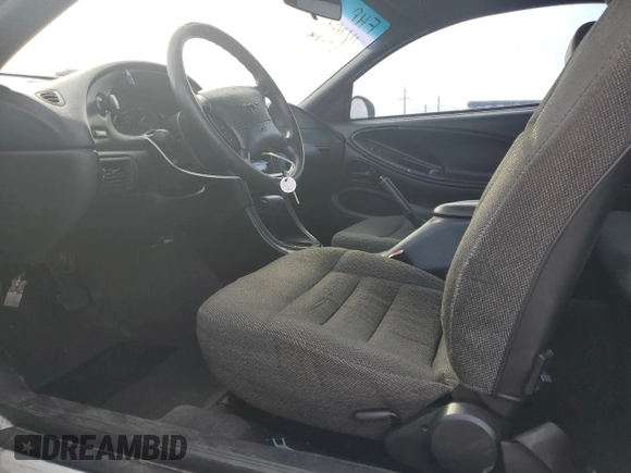 1997 Ford Mustang with VIN 1FALP4044VF174876, listed as a Copart auction lot 41601355 with 103,828 mi miles and Salvage Title. Bid and sale history available at carsss.com. Image 7.
