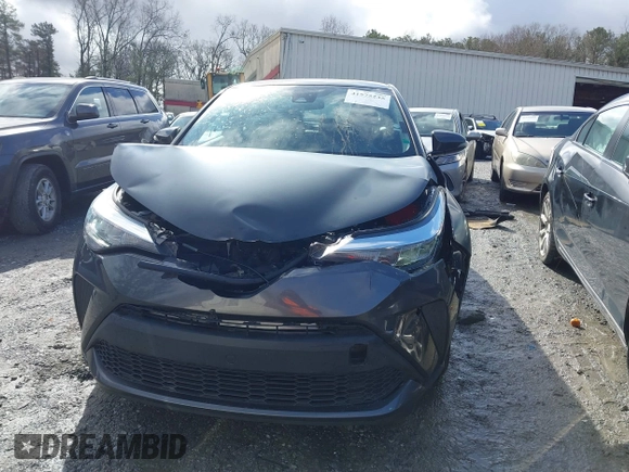 2021 Toyota C-HR LE with VIN NMTKHMBX9MR128998, listed as a IAAI auction lot 41575235 with 96,908 mi miles. Bid and sale history available at carsss.com. Image 12.
