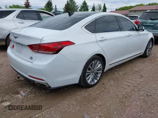 2017 Genesis G80 3.8L z VIN KMHGN4JEXHU166690, wystawiony jako IAAI lot #42322211 z przebiegiem 111 599 mil mil oraz . Historia ofert i sprzedaży dostępna na DreamBid. Obrazek 4.