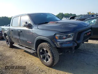 2019 Ram 1500 Rebel with VIN 1C6SRFLTXKN659501, listed as a IAAI auction lot 42572938 with 96,124 mi miles and . Bid and sale history available at DreamBid. Image 1.