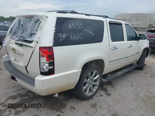 2013 Chevrolet Suburban LTZ with VIN 1GNSCKE00DR209381, listed as a IAAI auction lot 42469271 with Not provided miles and . Bid and sale history available at DreamBid. Image 4.