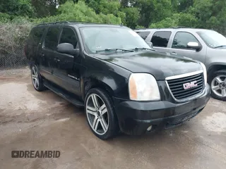 2007 GMC Yukon XL SLT z VIN 1GKFC16087J307794, wystawiony jako IAAI lot #42111880 z przebiegiem 349 480 mil mil oraz . Historia ofert i sprzedaży dostępna na DreamBid. Obrazek 1.