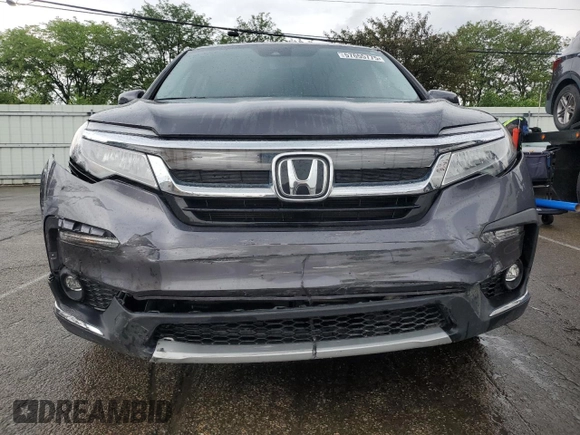 2020 Honda Pilot Touring 7-Passenger z VIN 5FNYF6H68LB052379, wystawiony jako Copart lot #57655775 z przebiegiem 73 501 mil mil oraz Szkoda całkowita • Salvage title. Historia ofert i sprzedaży dostępna na DreamBid. Obrazek 5.