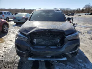 2021 BMW X1 xDrive28i with VIN WBXJG9C04M5T78933, listed as a Copart auction lot 45018135 with 72,067 mi miles and Salvage Title. Bid and sale history available at carsss.com. Image 5.
