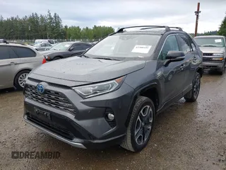 2021 Toyota RAV4 Hybrid XSE with VIN 2T3E6RFV4MW004081, listed as a IAAI auction lot 42300195 with 63,238 mi miles and . Bid and sale history available at DreamBid. Image 17.