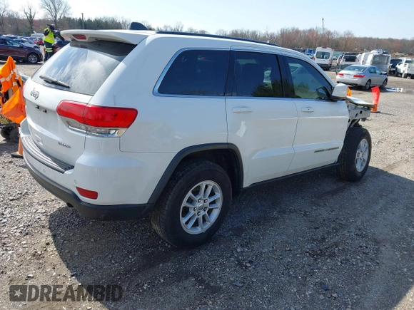 2018 Jeep Grand Cherokee Laredo E with VIN 1C4RJEAG3JC300760, listed as a IAAI auction lot 41811734 with 131,406 mi miles. Bid and sale history available at carsss.com. Image 4.