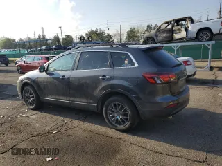 2015 Mazda CX-9 Grand Touring with VIN JM3TB3DV2F0453812, listed as a Copart auction lot 54445115 with 176,067 mi miles and Salvage title. Bid and sale history available at DreamBid. Image 2.