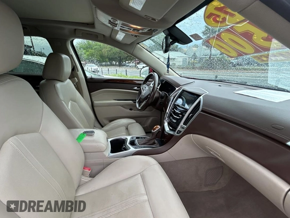 2015 Cadillac SRX Luxury Collection z VIN 3GYFNBE37FS569840, wystawiony jako Copart lot #56965835 z przebiegiem 183 817 mil mil oraz Tytuł czysty. Historia ofert i sprzedaży dostępna na DreamBid. Obrazek 5.