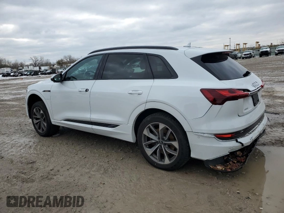 2021 Audi e-tron Premium Plus with VIN WA1LAAGE4MB003487, listed as a Copart auction lot 82790024 with 28,165 mi miles and Salvage title. Bid and sale history available at DreamBid. Image 2.