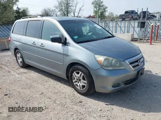 2005 Honda Odyssey EX-L with VIN 5FNRL38755B014826, listed as a IAAI auction lot 42147100 with 145,484 mi miles. Bid and sale history available at carsss.com. Image 1.
