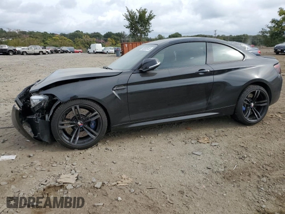 2018 BMW M2 with VIN WBS1J5C51JVD36181, listed as a Copart auction lot 70202013 with 34,549 mi miles. Bid and sale history available at carsss.com. Image 1.