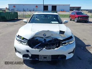 2021 BMW 3 Series 330i xDrive with VIN WBA5R7C0XMFK54525, listed as a IAAI auction lot 42320181 with 54,576 mi miles and . Bid and sale history available at DreamBid. Image 12.