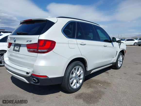 2015 BMW X5 xDrive35d with VIN 5UXKS4C59F0J99185, listed as a IAAI auction lot 41783451 with 78,148 mi miles. Bid and sale history available at carsss.com. Image 4.