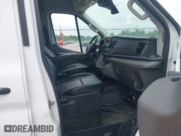 2024 Ford Transit Cargo z VIN 1FTBR3X89RKA14329, wystawiony jako IAAI lot #42483348 z przebiegiem 85 692 mil mil oraz . Historia ofert i sprzedaży dostępna na DreamBid. Obrazek 5.