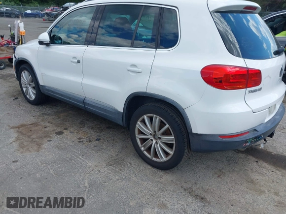 2012 Volkswagen Tiguan S with VIN WVGAV7AX0CW566151, listed as a IAAI auction lot 42826985 with 121,185 mi miles and . Bid and sale history available at DreamBid. Image 3.