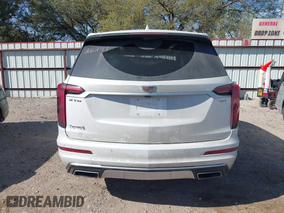 2021 Cadillac XT6 Premium Luxury z VIN 1GYKPCRS6MZ230499, wystawiony jako IAAI lot #41808404 z przebiegiem 86 933 mil mil oraz . Historia ofert i sprzedaży dostępna na DreamBid. Obrazek 17.