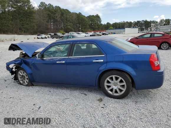 2009 Chrysler 300 LX with VIN 2C3KA43D29H581073, listed as a Copart auction lot 48702345 with 142,917 mi miles and Salvage Title. Bid and sale history available at carsss.com. Image 2.