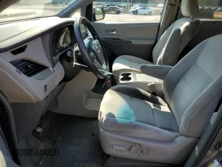 2015 Toyota Sienna LE AAS with VIN 5TDKK3DCXFS651621, listed as a Copart auction lot 66263885 with 150,578 mi miles and Salvage title. Bid and sale history available at DreamBid. Image 7.
