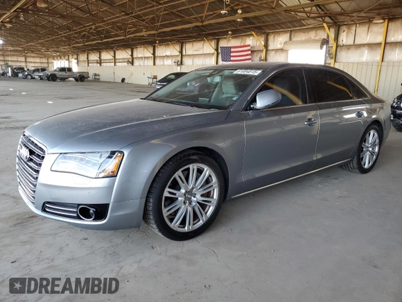 2012 Audi A8 with VIN WAURVAFD0CN028037, listed as a Copart auction lot 61004815 with 97,424 mi miles and Salvage title. Bid and sale history available at DreamBid. Image 1.