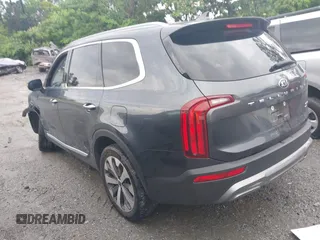 2021 Kia Telluride S with VIN 5XYP64HC8MG127498, listed as a IAAI auction lot 42371890 with 100,748 mi miles and . Bid and sale history available at DreamBid. Image 3.