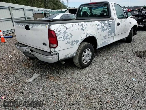 1999 Ford F-150 z VIN 1FTRF17W0XNB79739, wystawiony jako Copart lot #87840925 z przebiegiem Nie podano mil oraz Szkoda całkowita • Salvage title. Historia ofert i sprzedaży dostępna na DreamBid. Obrazek 11.