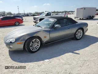 2005 Jaguar XK with VIN SAJDA42CX52A43502, listed as a Copart auction lot 44317995 with 73,760 mi miles and Salvage Title. Bid and sale history available at carsss.com. Image 1.