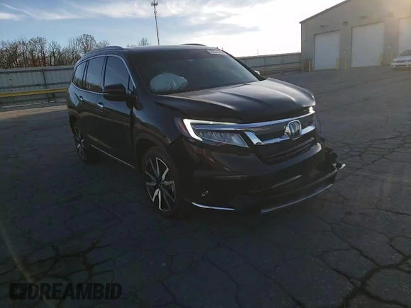 2021 Honda Pilot Touring 8-Passenger with VIN 5FNYF5H94MB039974, listed as a Copart auction lot 82654964 with 54,048 mi miles and Salvage Title. Bid and sale history available at DreamBid. Image 12.
