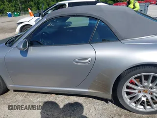 2006 Porsche 911 Carrera S z VIN WP0CB29976S766616, wystawiony jako IAAI lot #42119525 z przebiegiem 57 164 mil mil oraz . Historia ofert i sprzedaży dostępna na DreamBid. Obrazek 14.
