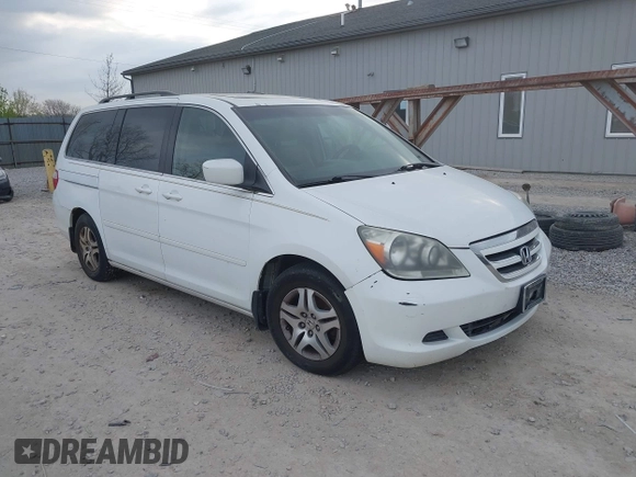 2007 Honda Odyssey EX-L with VIN 5FNRL38607B403903, listed as a IAAI auction lot 42074718 with 148,816 mi miles. Bid and sale history available at carsss.com. Image 1.
