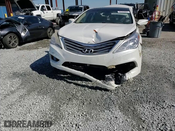 2014 Hyundai Azera Limited z VIN KMHFH4JG1EA361448, wystawiony jako Copart lot #42344065 z przebiegiem 178 452 mil mil oraz Szkoda całkowita • Salvage title. Historia ofert i sprzedaży dostępna na DreamBid. Obrazek 13.
